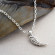 Your White Raptor Claw Pendant: A Roar of Craftsmanship!