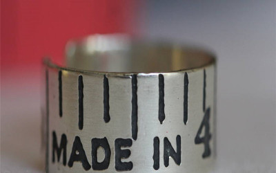 Crafting Gold Name Necklace's Vintage Tape Measure Ring: A Story of Shine