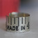 Crafting Gold Name Necklace's Vintage Tape Measure Ring: A Story of Shine