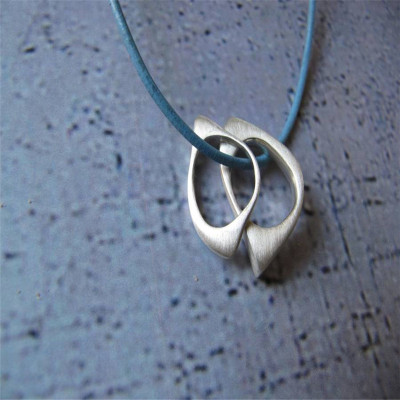 Solid Gold U And Me Infinity Pendants On Leather